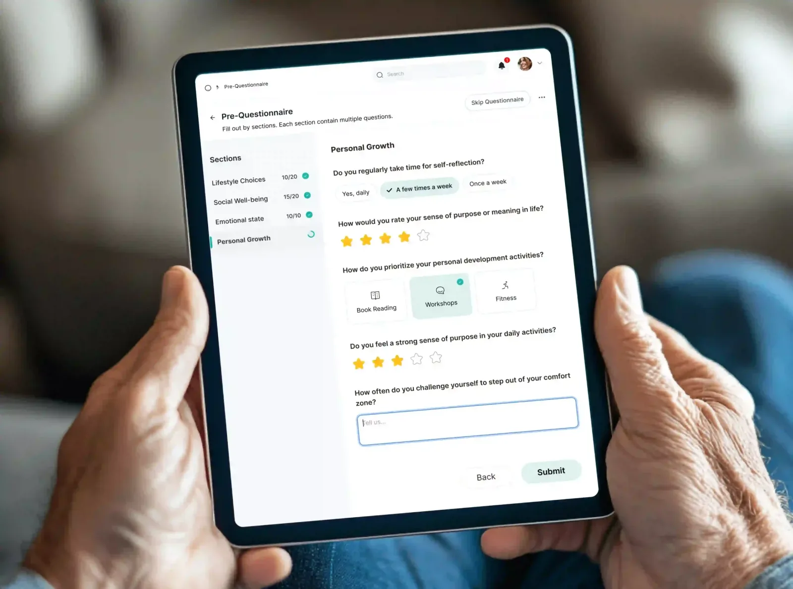 An older adult holding a tablet with the Elia Wellness pre-questionnaire on personal growth